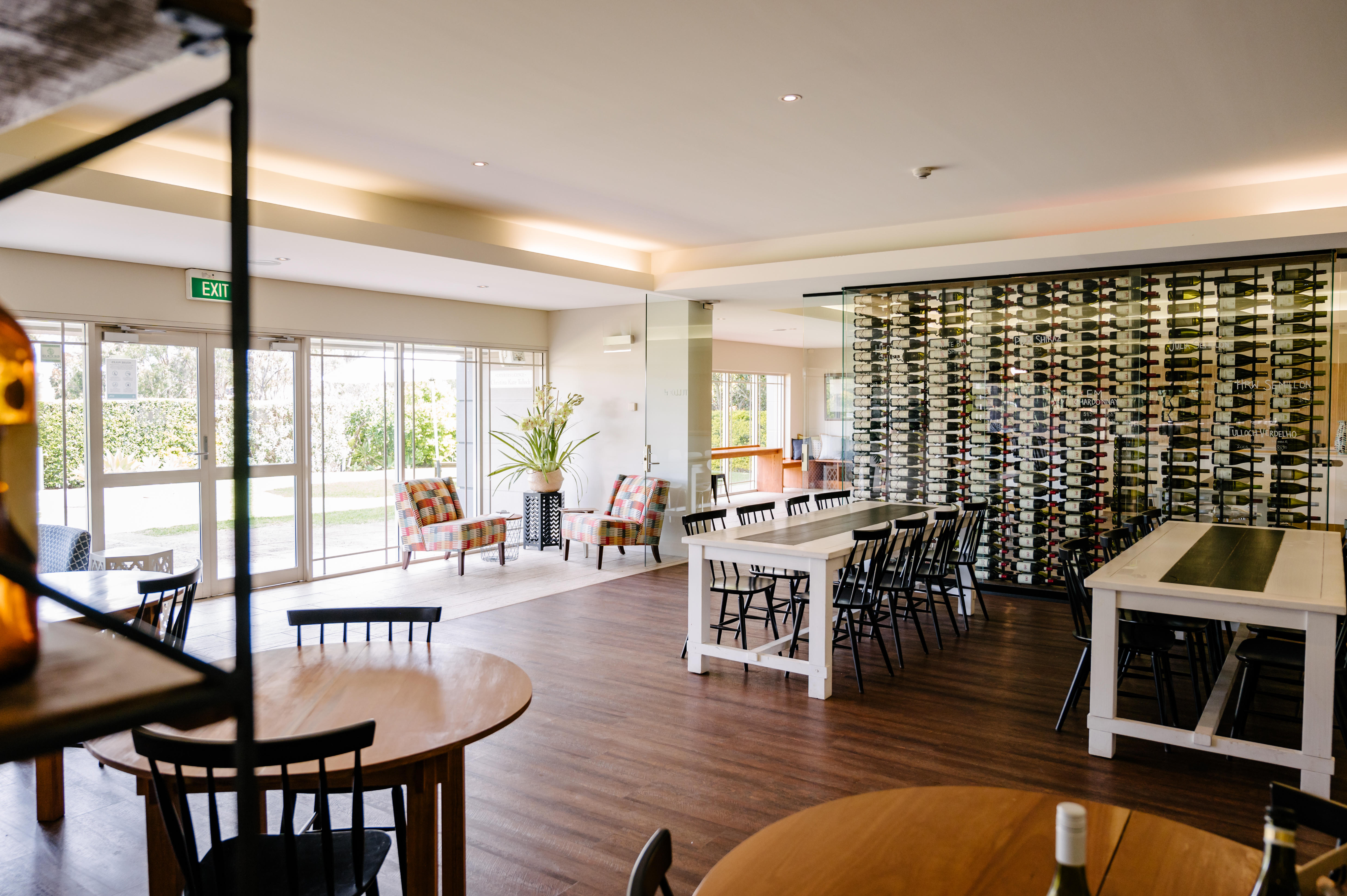 Picture of one of our unique spaces suitable for Meeting and Events. This downstairs space features its own private entrance, lots of natural light and is a contemporary style with our unique 'wine wall' and historic Tulloch truck.